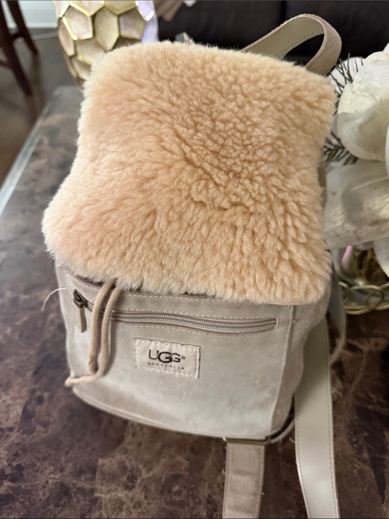 UGG Handbags - UGG Women's Sheepskin Flap Drawstring Backpack in Beige
